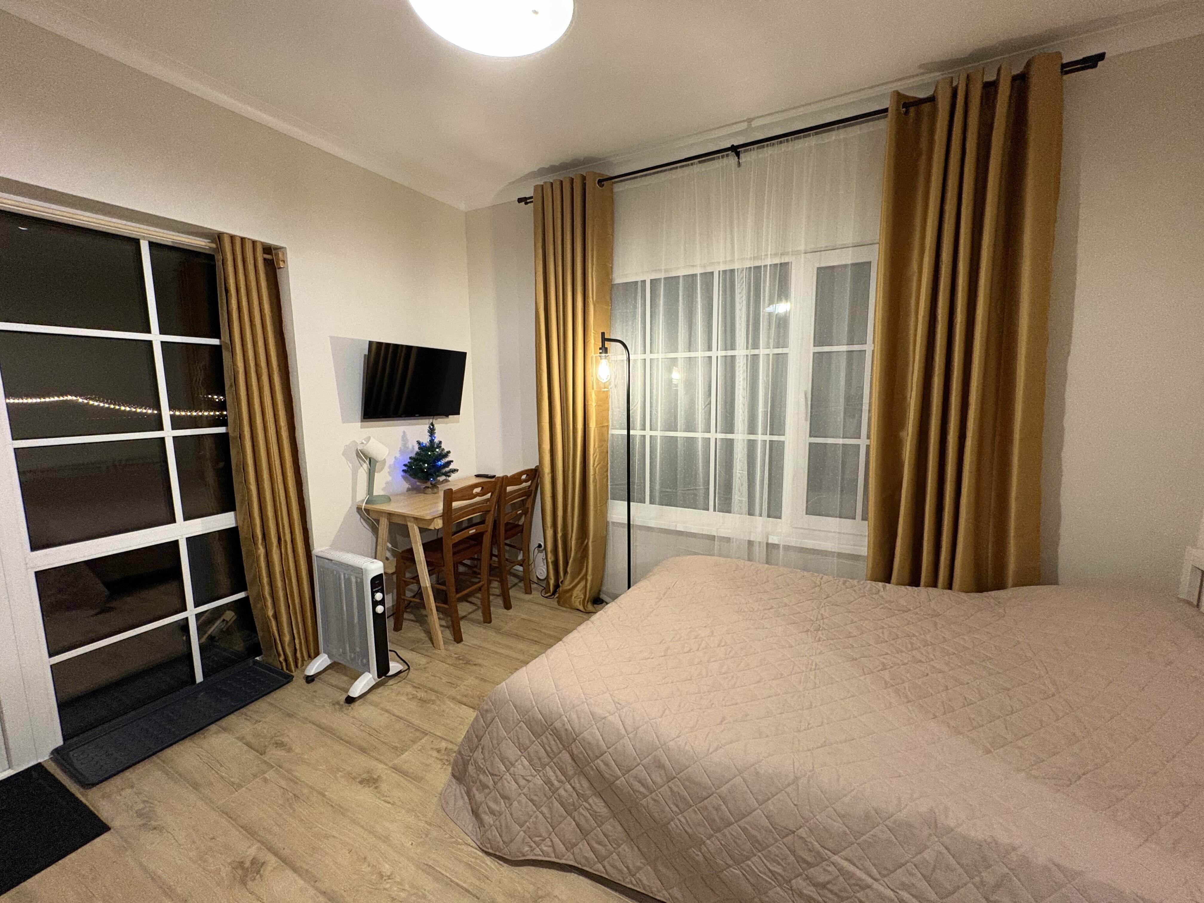 Студия-комфорт в загородном доме с видом на лес