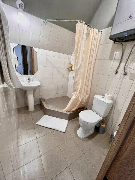 Двухместный номер с 2 отдельными кроватями и душем