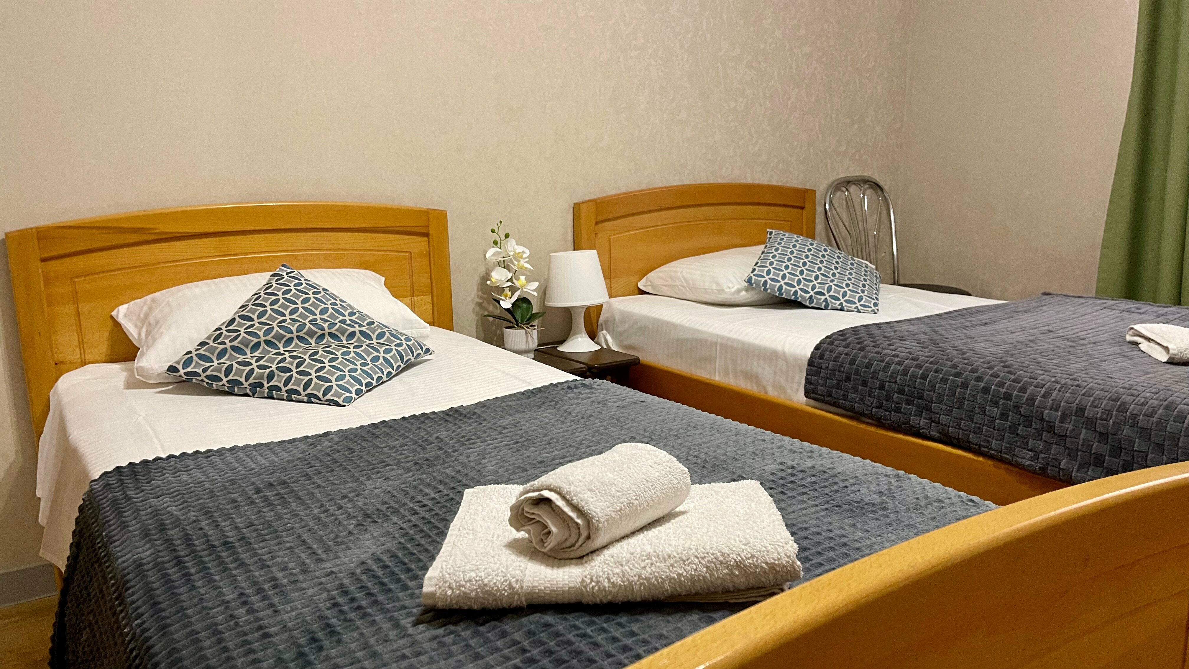 Двухместный номер эконом-класса с 2 отдельными кроватями