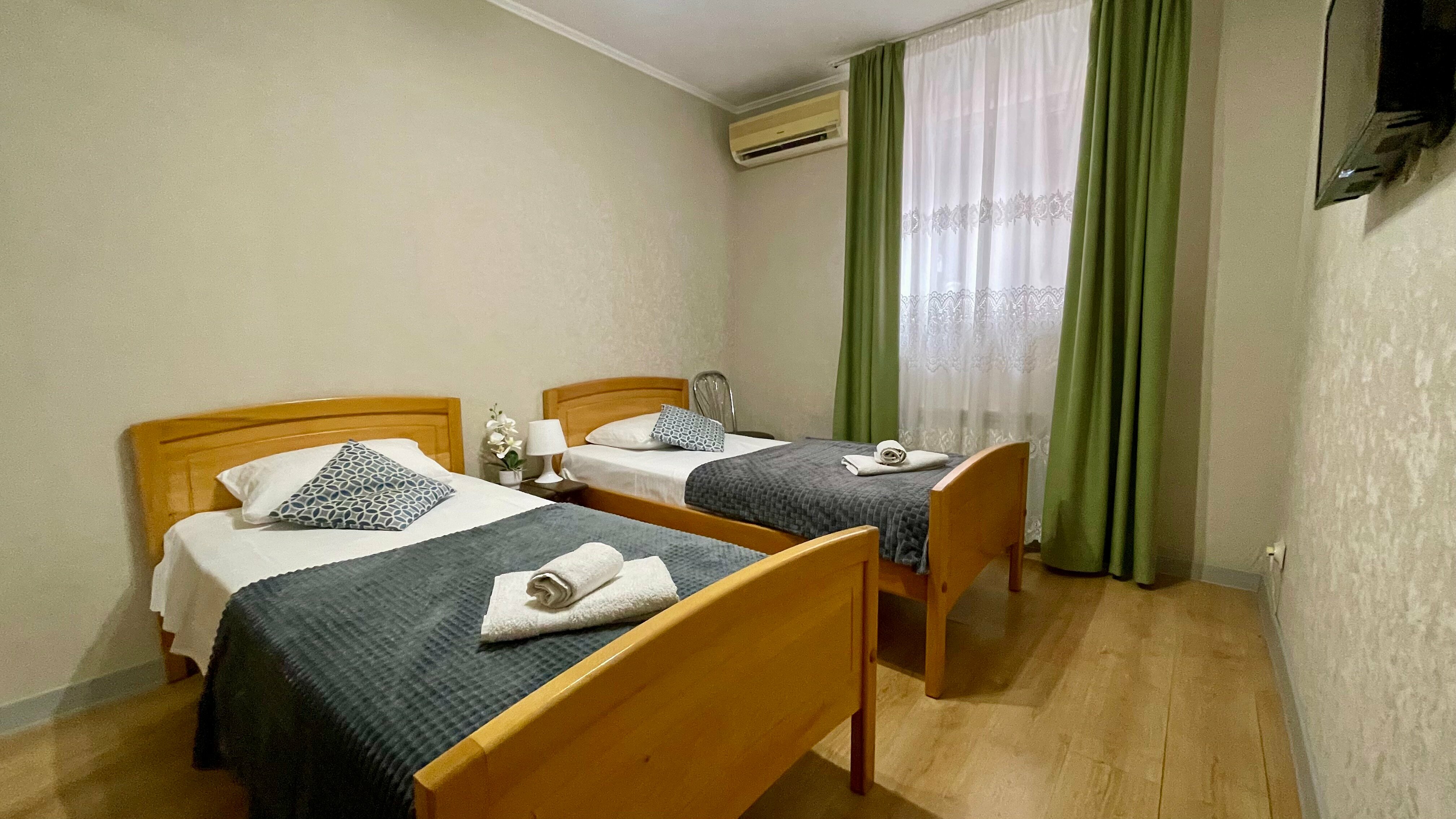 Двухместный номер эконом-класса с 2 отдельными кроватями