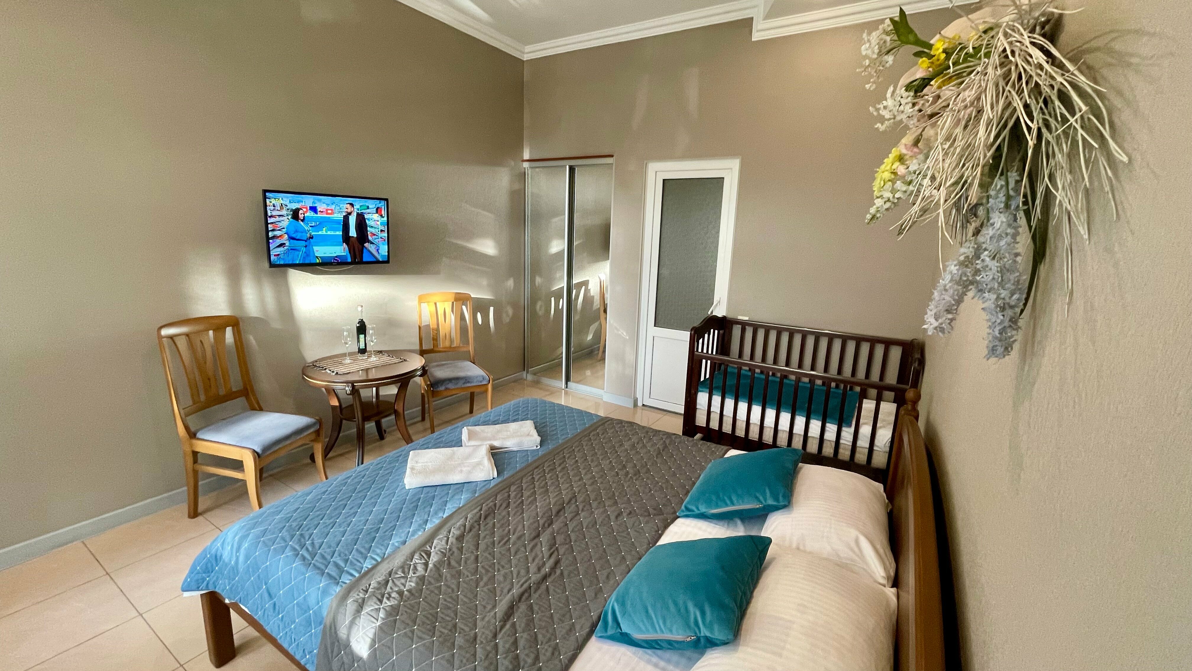 Трехместный номер с балконом