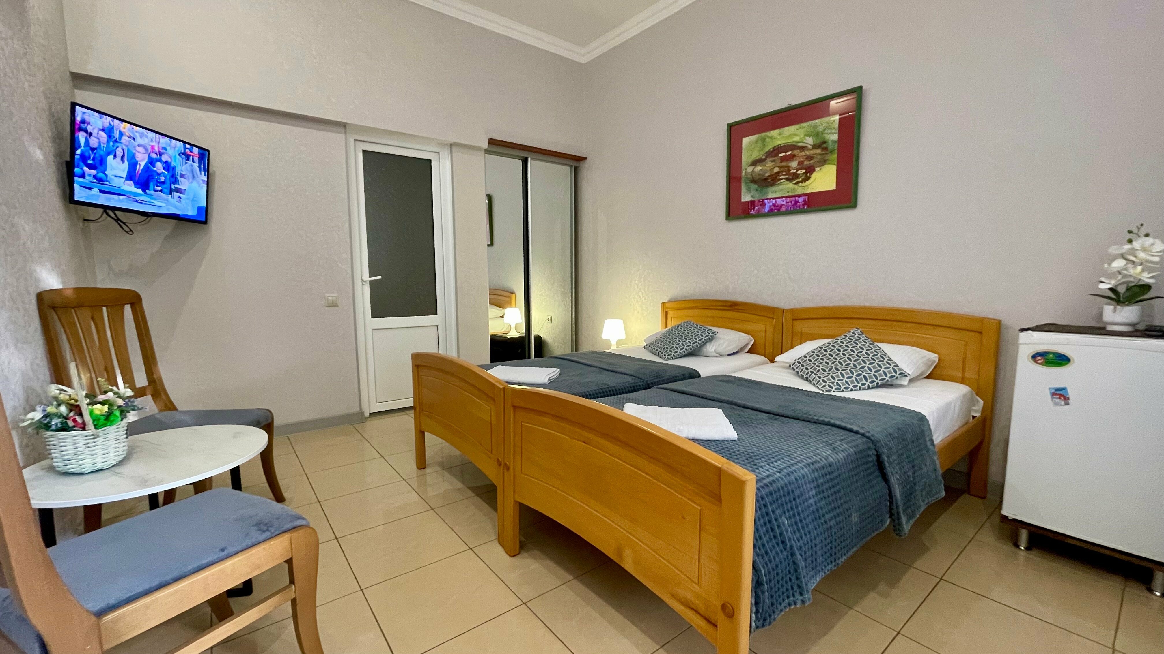 Трехместный номер с балконом