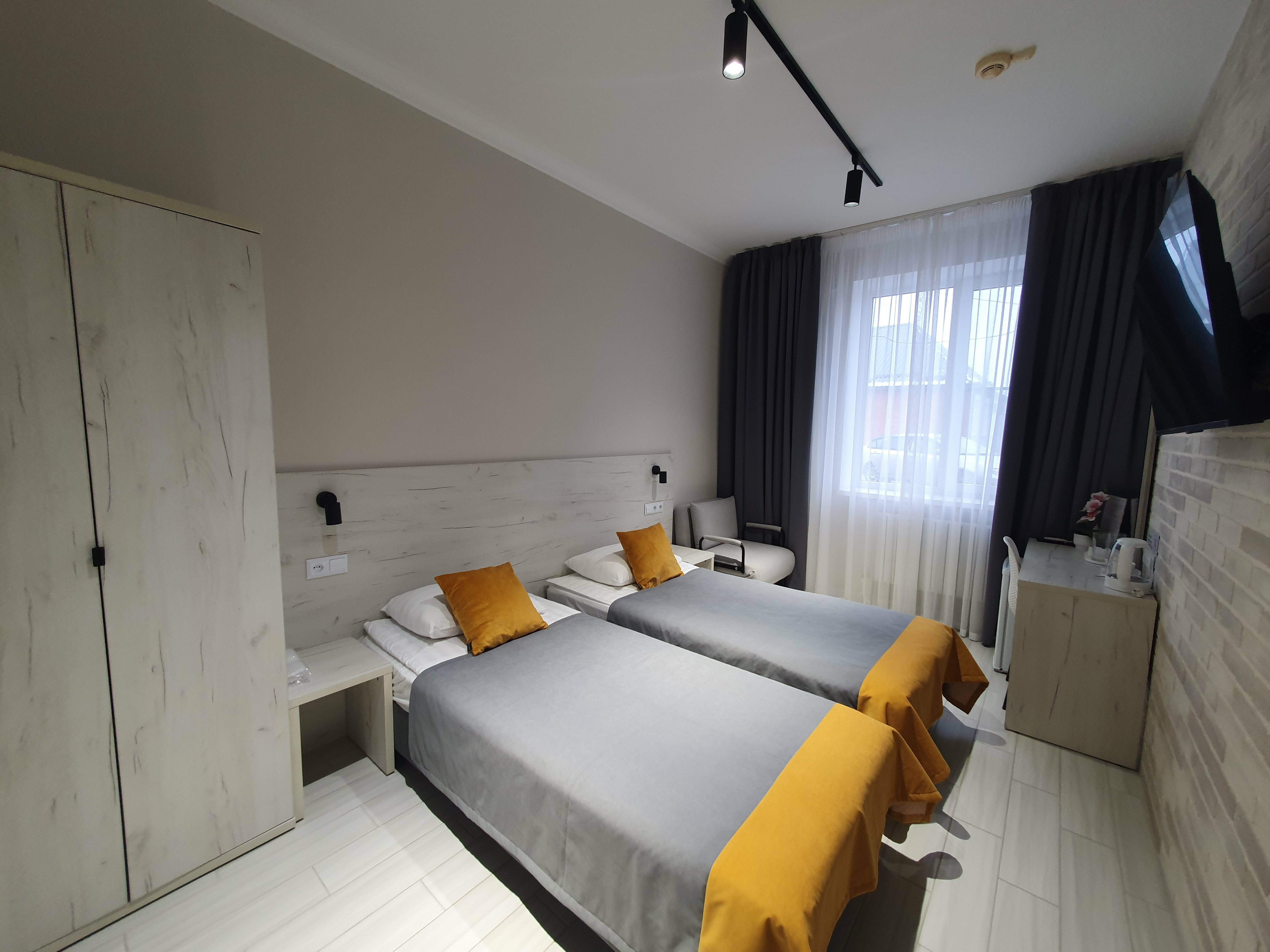 Улучшенный двухместный номер с 2 отдельными кроватями