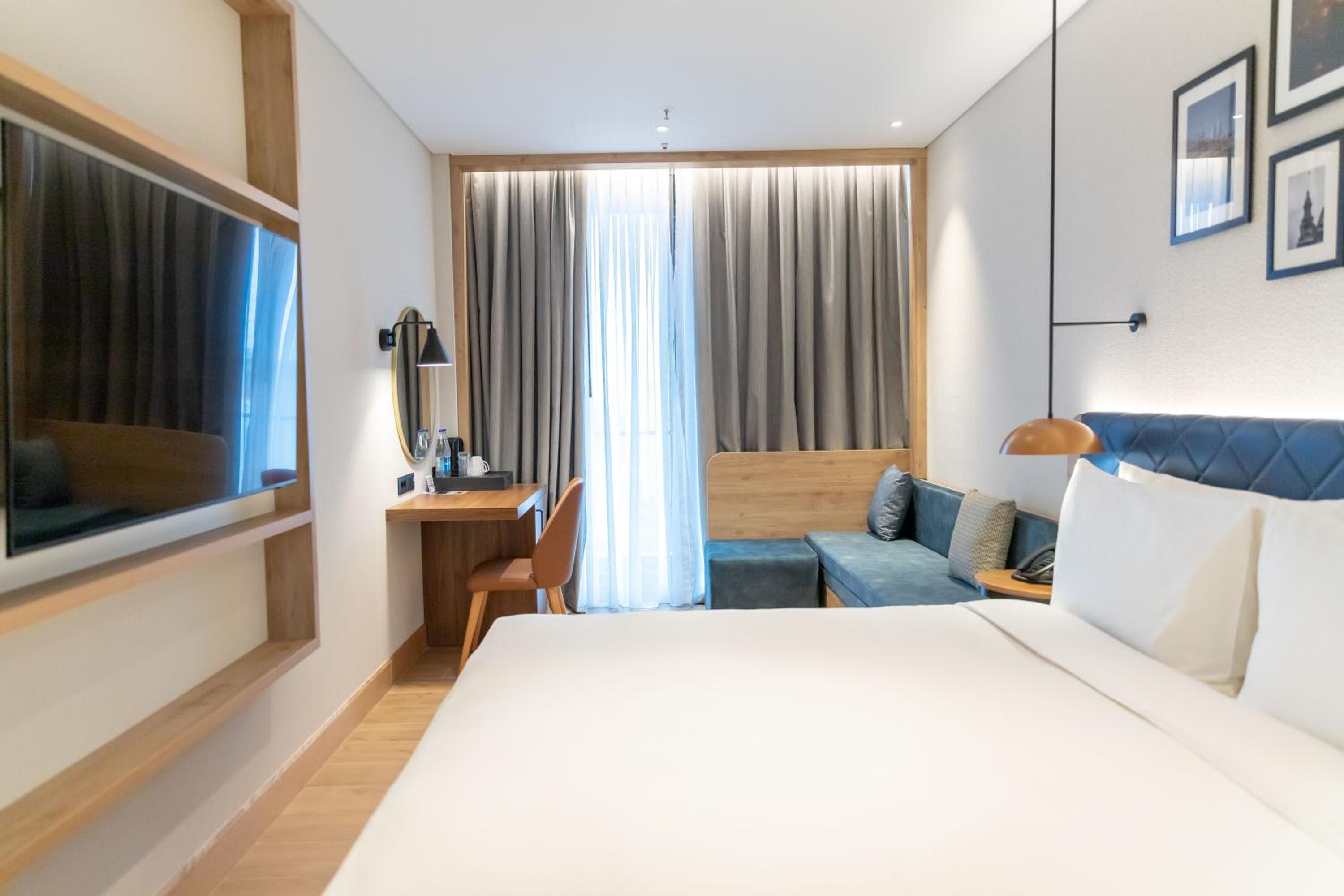 King Room with Sofa Bed and City View