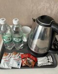 Двухместный номер эконом-класса с 2 односпальными кроватями и общей ванной в Вояж