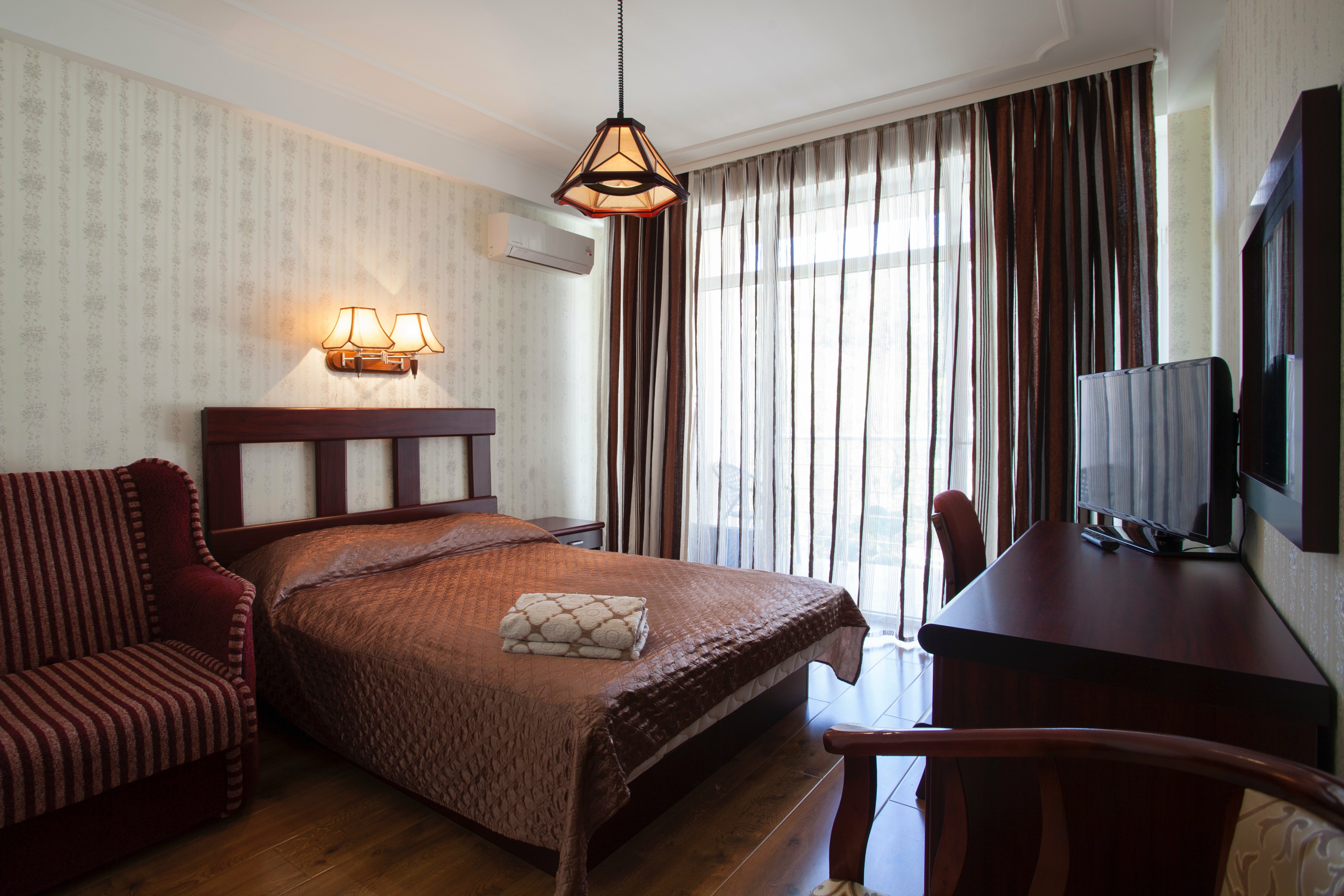 Двухместный номер с 2 отдельными кроватями и балконом