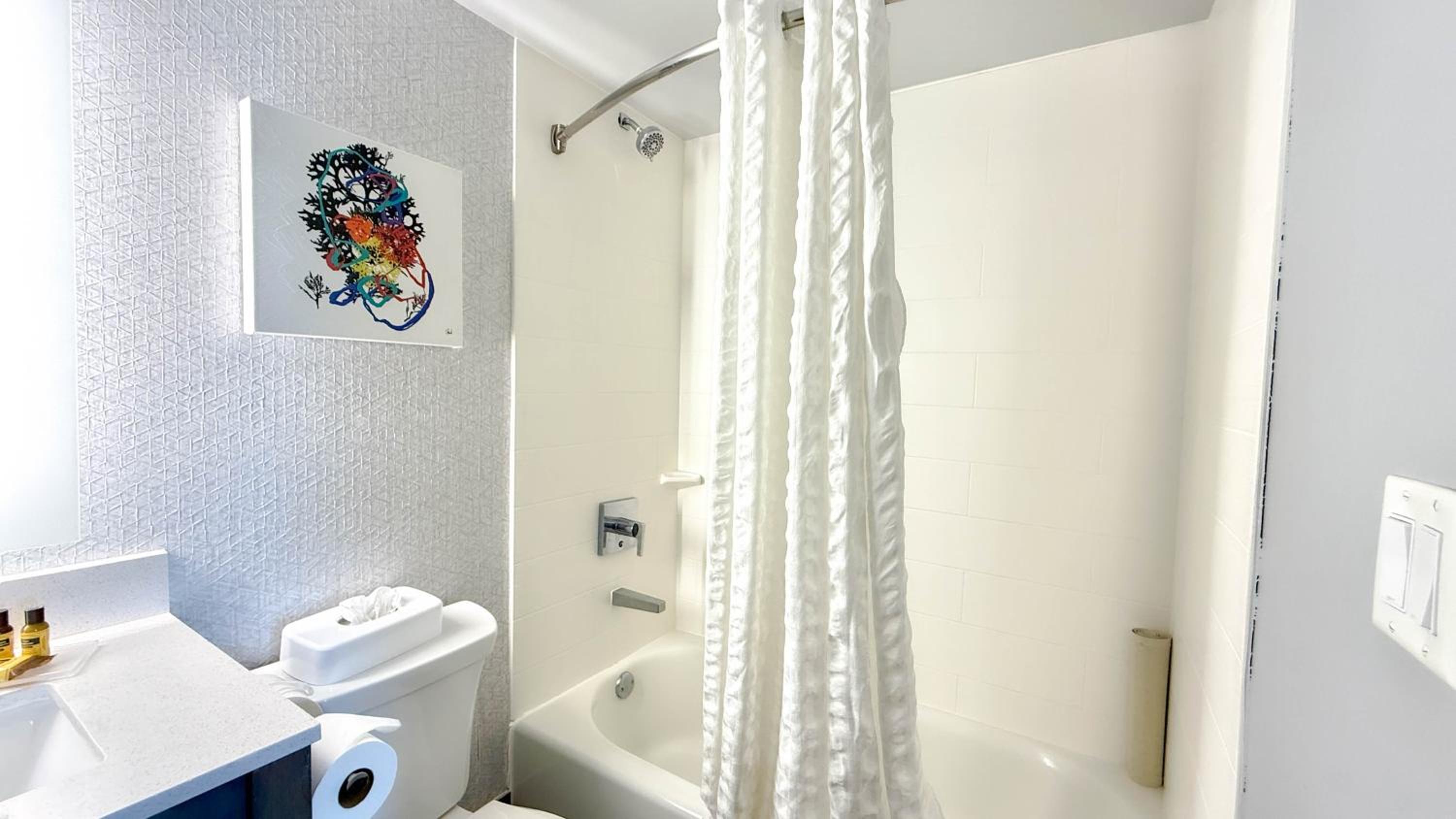 Two-Room King Suite with Sofa Bed and Partial Ocean View - Non-Smoking