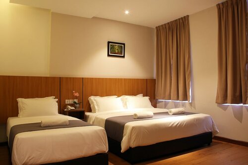 Deluxe Triple Room в Ahyu Hotel