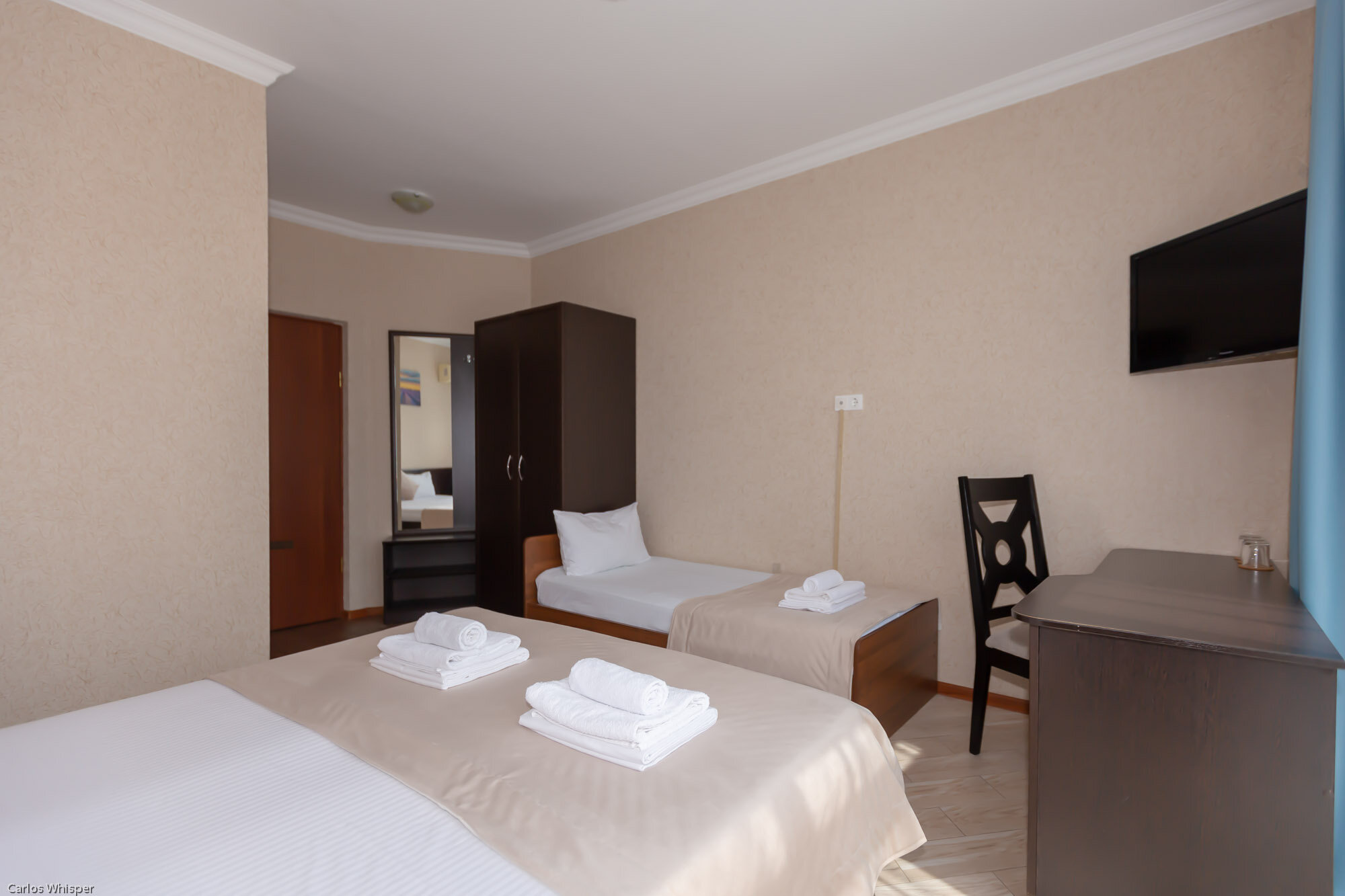 Трехместный номер с балконом