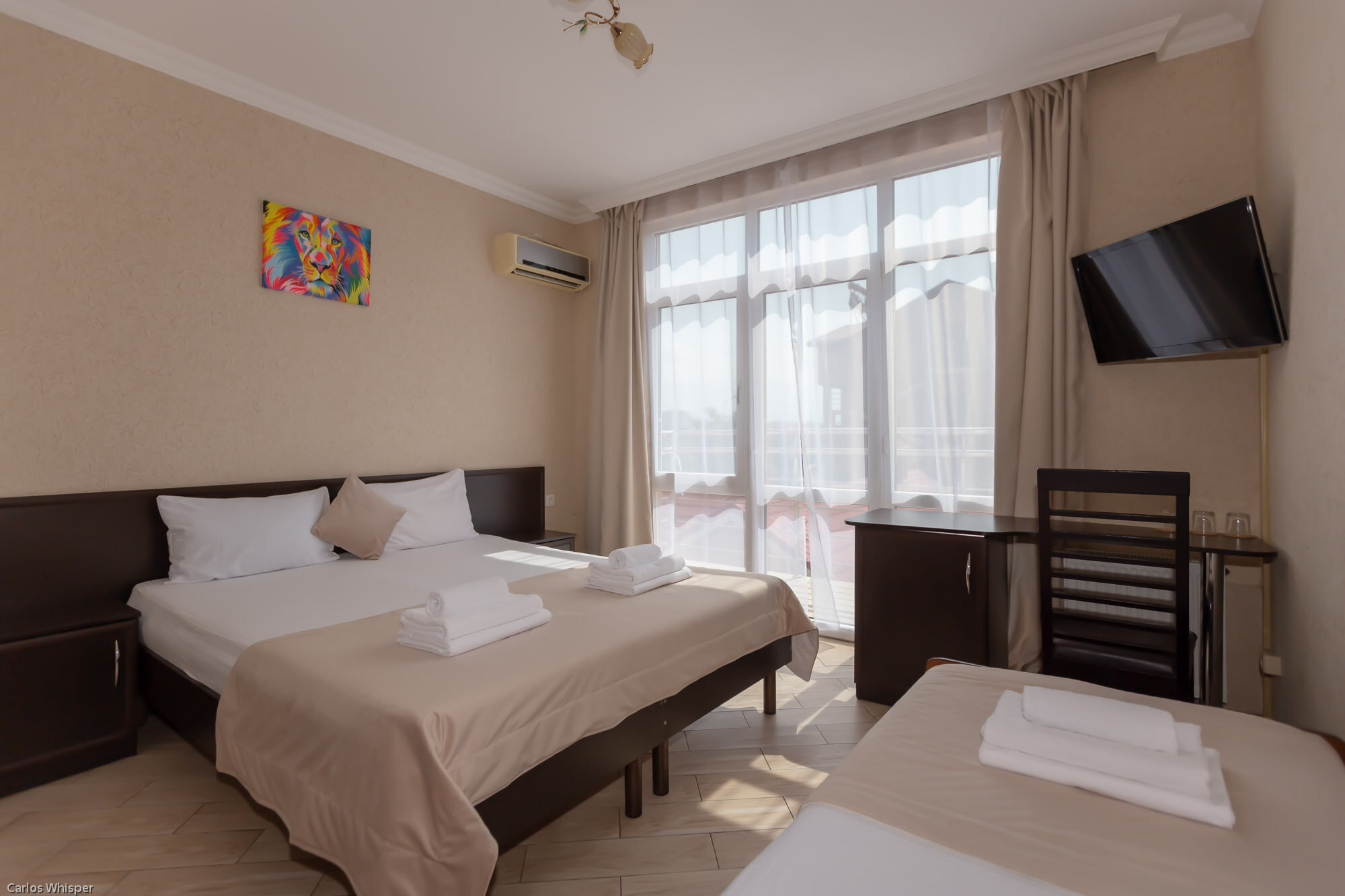 Трехместный номер с балконом