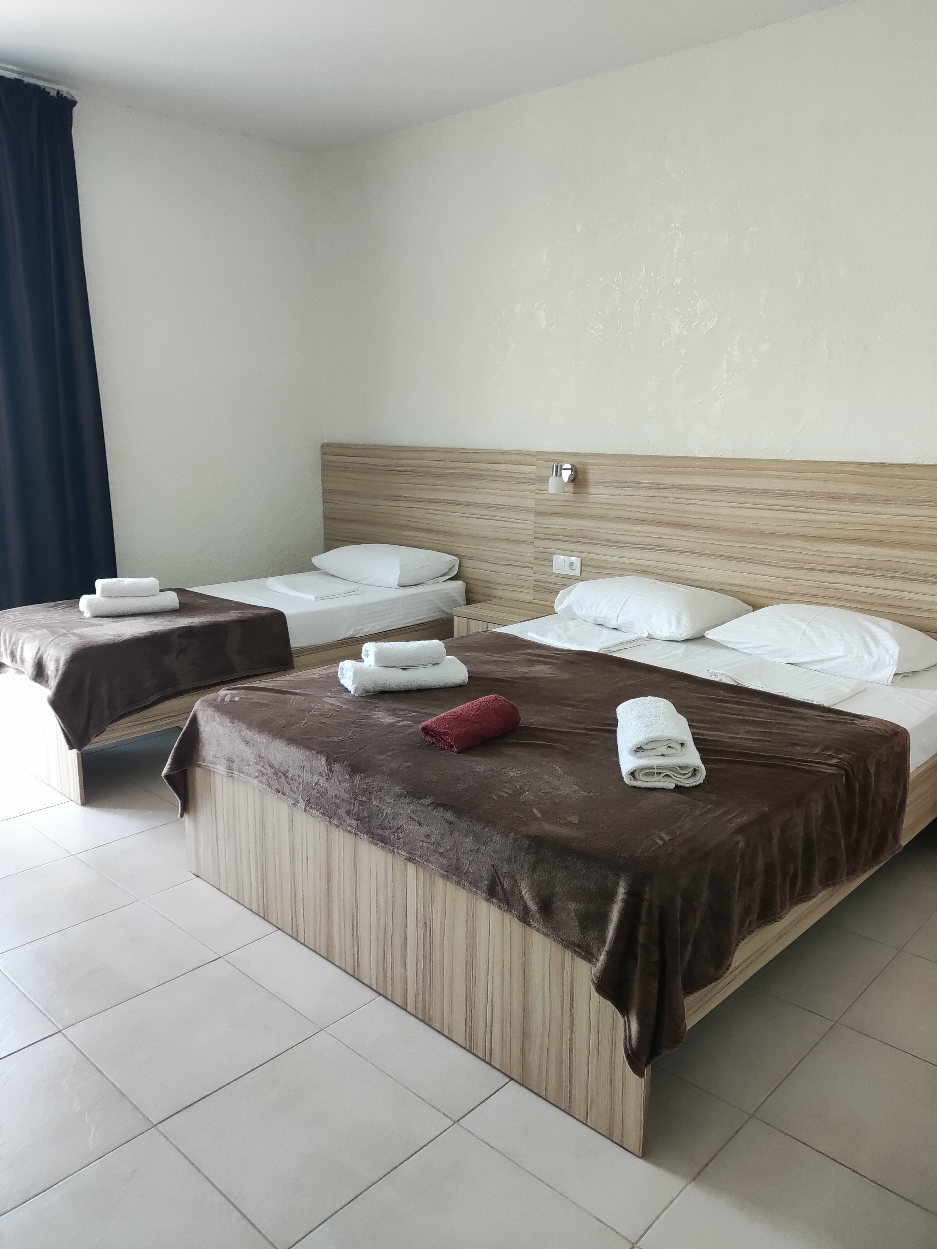 Трехместный номер с балконом