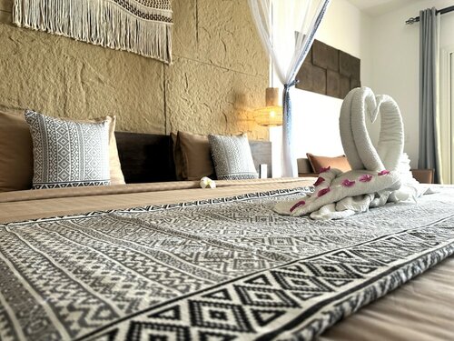 Номер в Reef & Beach Resort