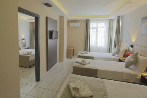 Семейный четырехместный номер в Alanya Risus Park Hotel