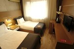 Номер с 2 односпальными кроватями в Rhisos otel