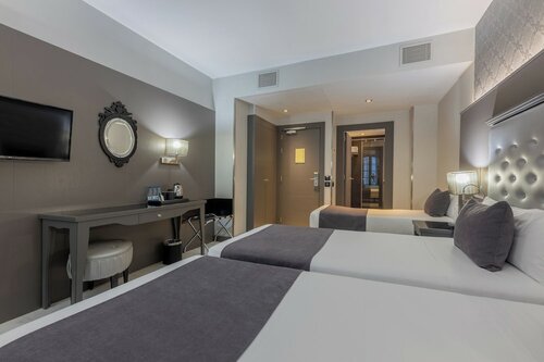 Doble con cama extra в Hotel Ciutadella Barcelona
