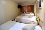 Стандартный трехместный номер в Mengo Palace Hotel