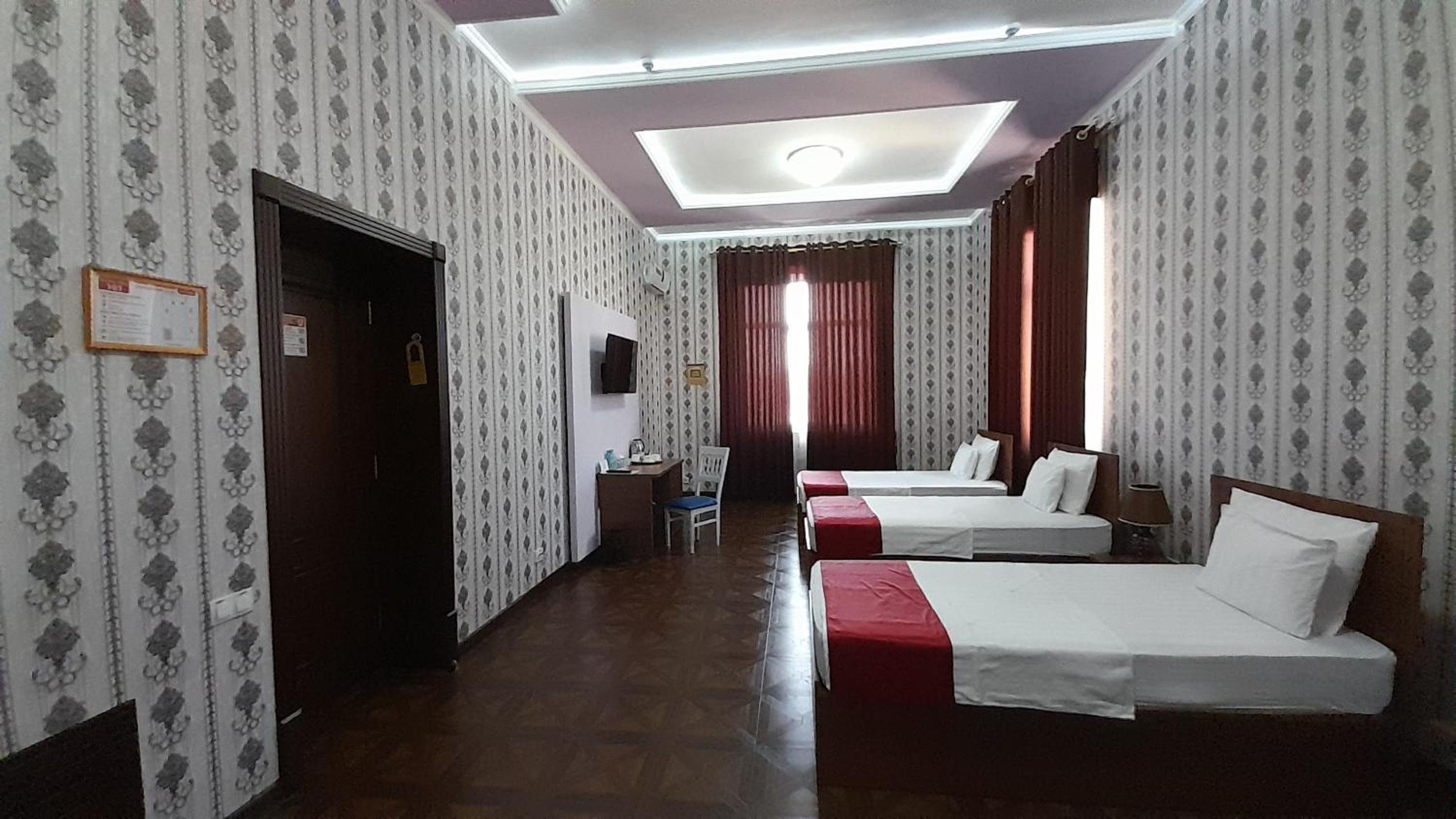 Deluxe Triple Room
