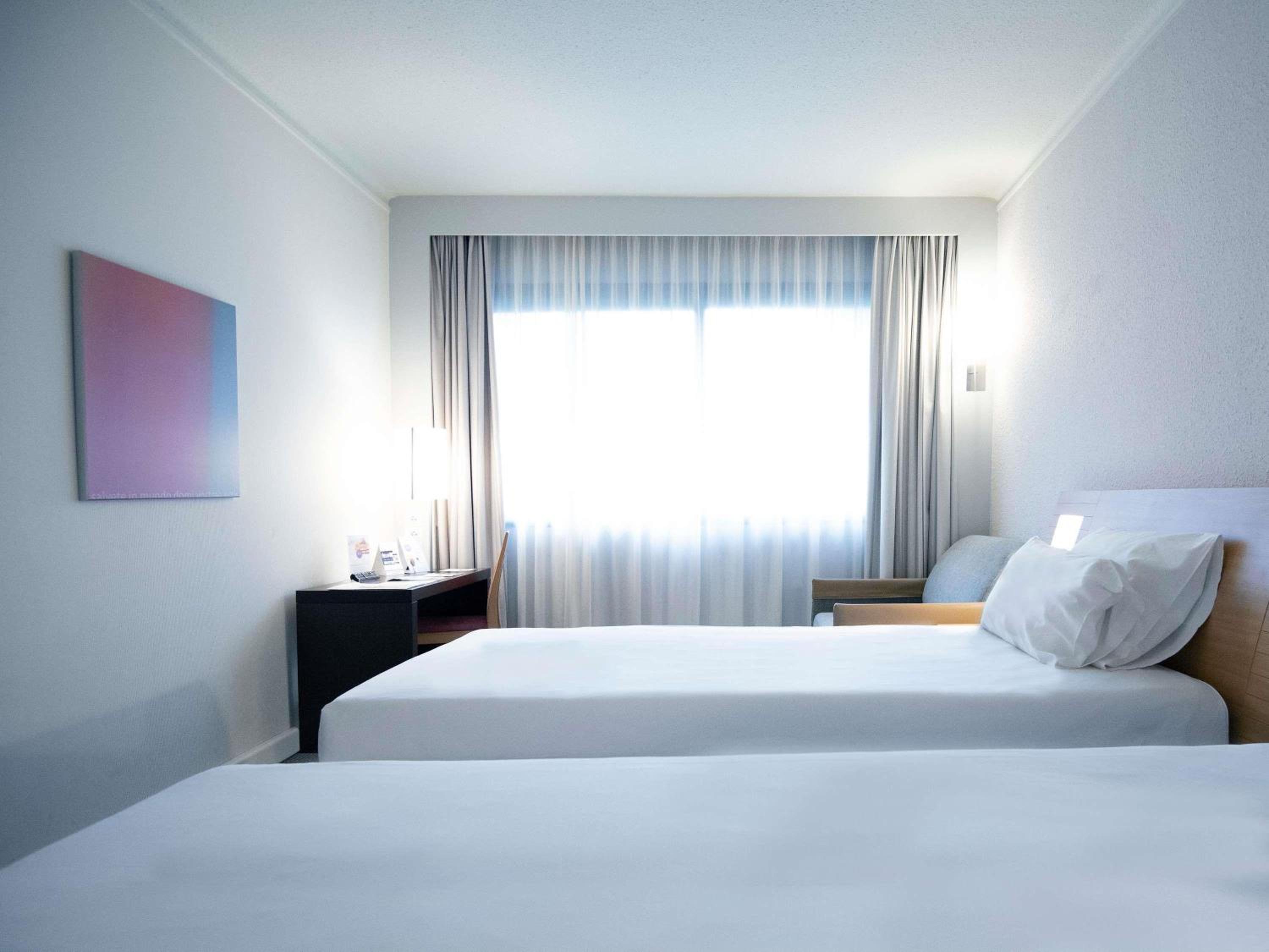 Standard Twin Room, 2 single beds and 1 single sofa bed