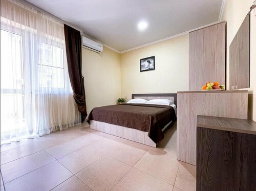 Двухместный номер с двуспальной кроватью и дополнительной кроватью