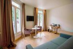 Улучшенный четырехместный номер в B&B Home Brides-les-Bains Les 3 Vallées