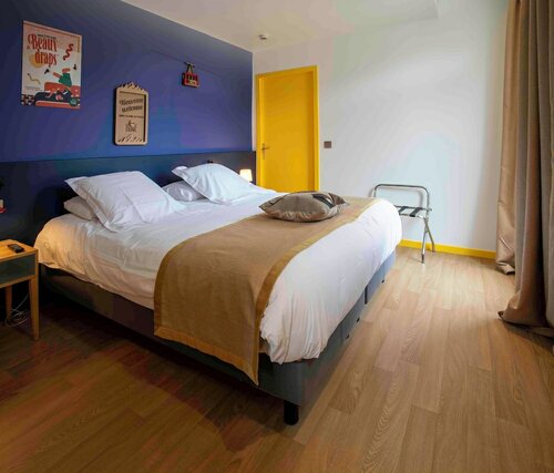 Улучшенный четырехместный номер в B&B Home Brides-les-Bains Les 3 Vallées