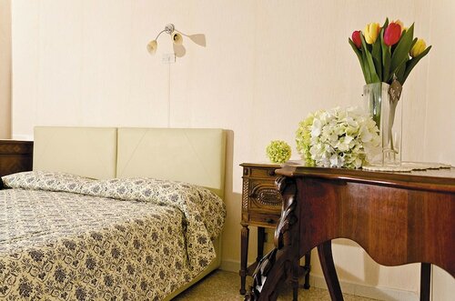 Номер «Комфорт», вид на сад в Leonardo's B&b
