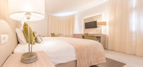 Улучшенный двухместный номер с 1 двуспальной кроватью в Loule Jardim Hotel