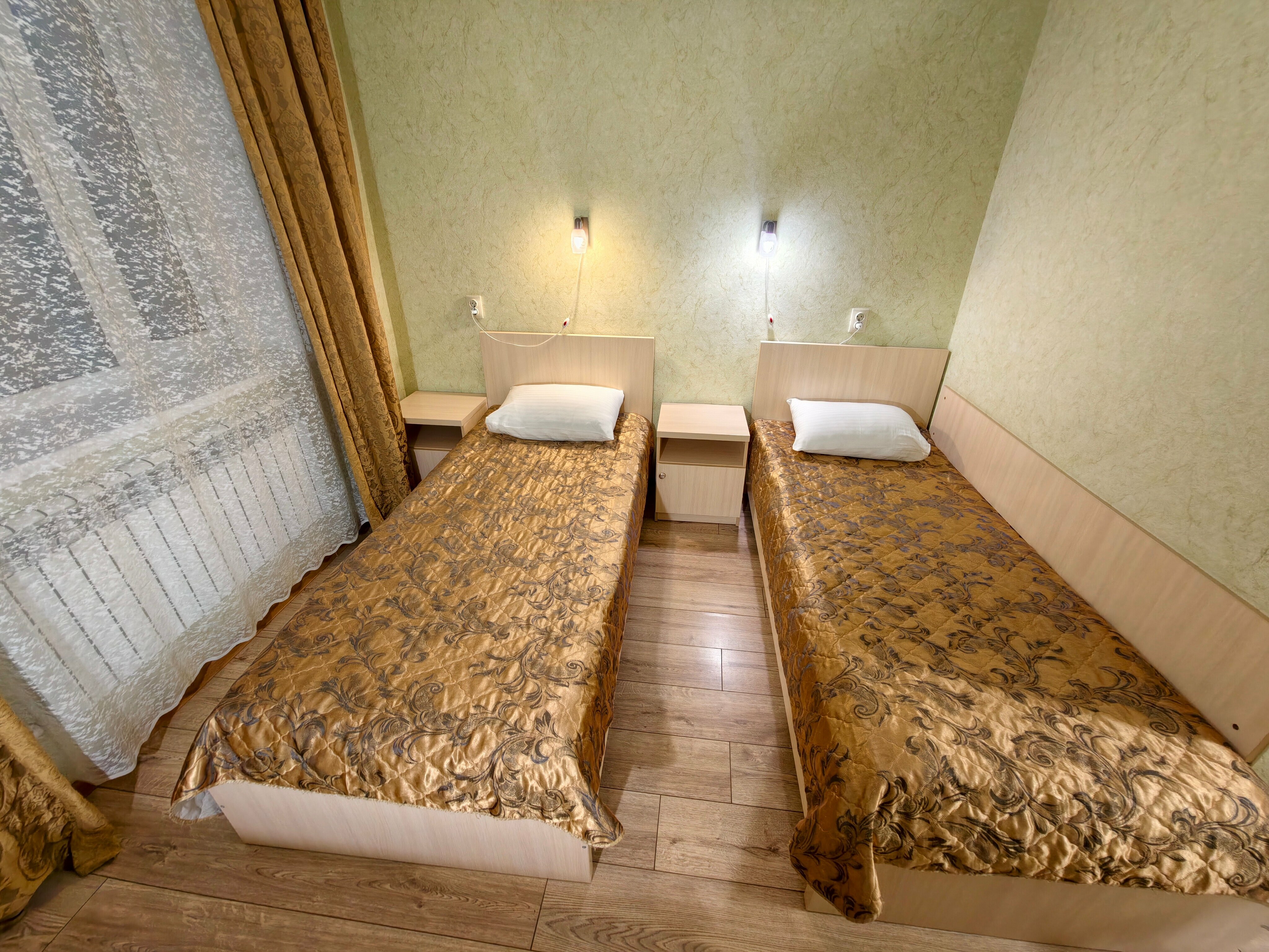 Стандартный двухместный номер с двумя кроватями