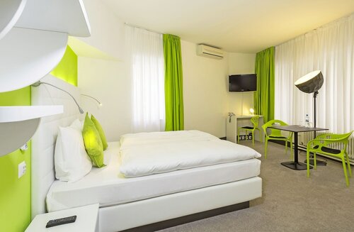 Двухместный номер «Делюкс» с 2 односпальными кроватями в City Inn Hotel