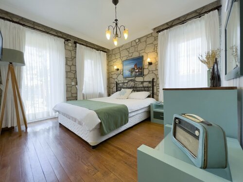 Deluxe Cift Kisilik veya iki Yatakli Oda в Каезта Отель