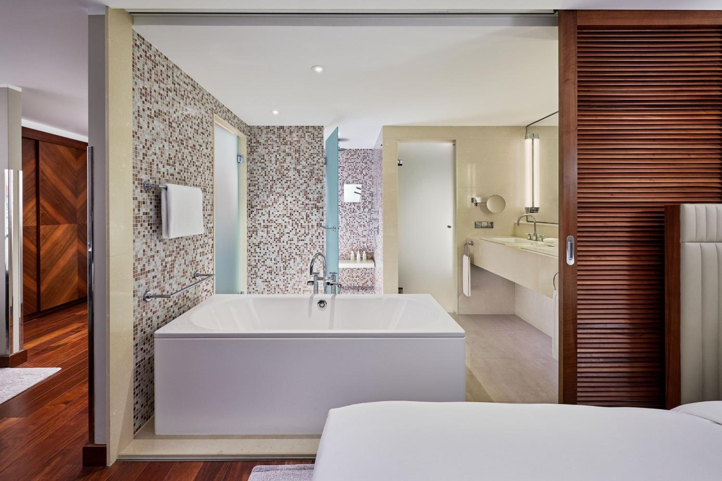 Deluxe Corner King Room with Sofa Bed