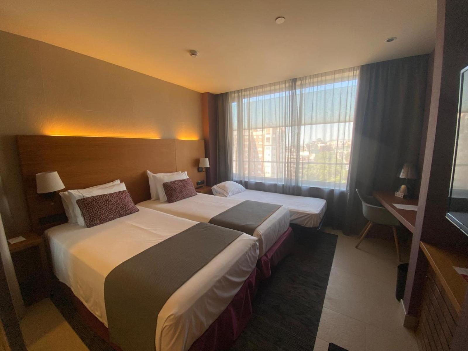 Double or Twin Room with Extra Bed (2 Adults + 1 Child)