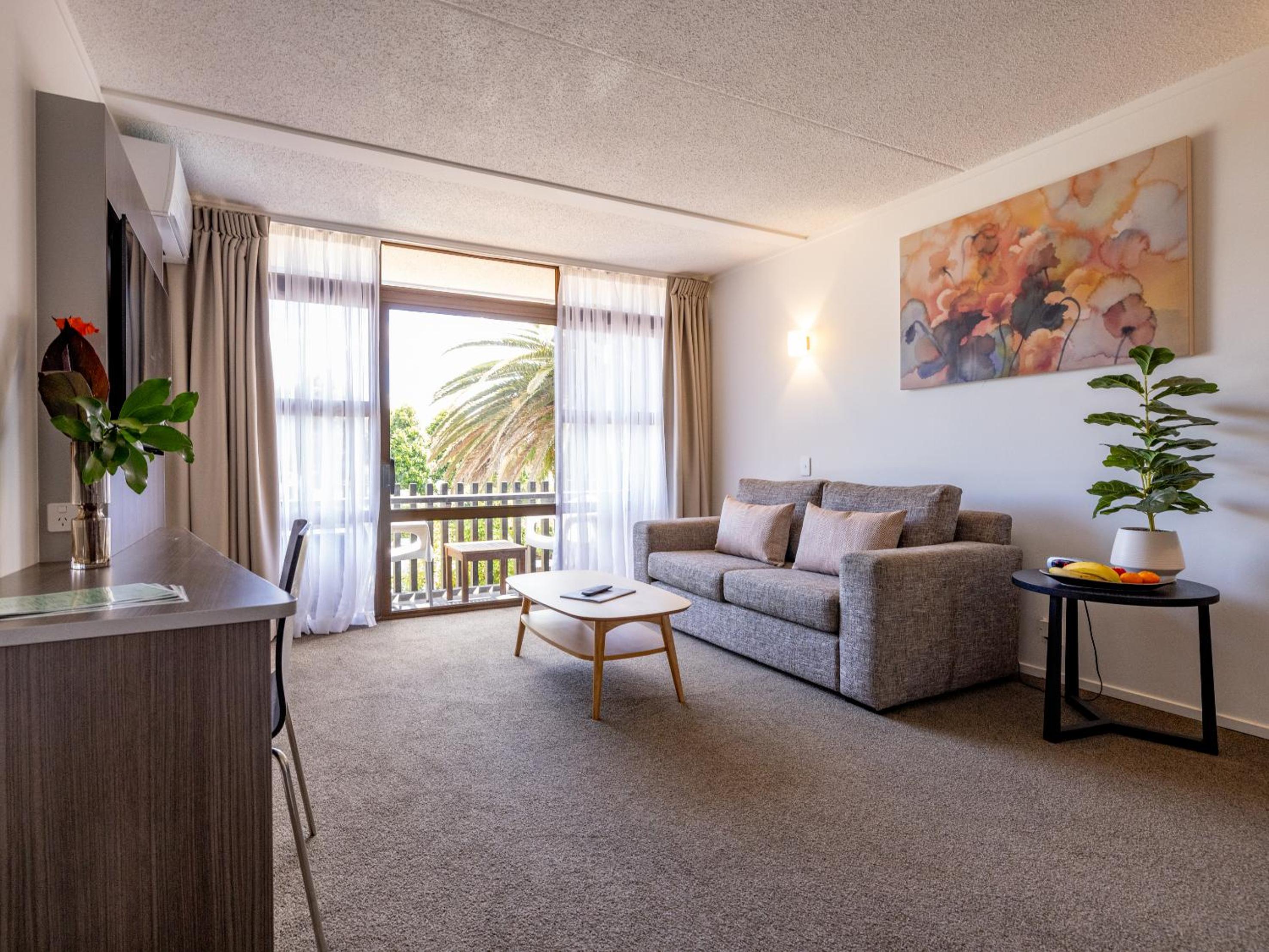 Superior King with Lounge and Balcony