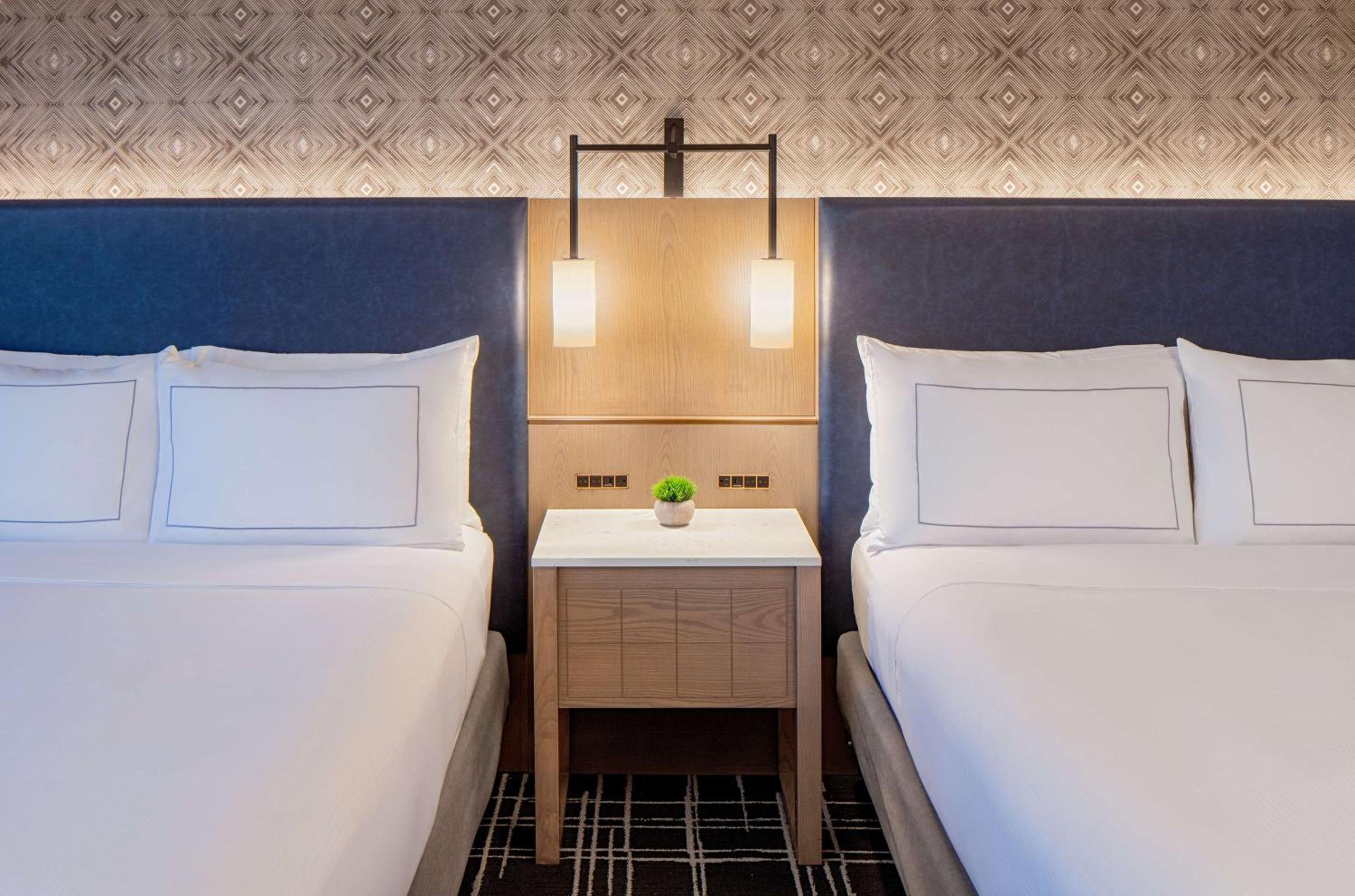 One-Bedroom Queen Suite with Two Queen Beds and Sofa Bed