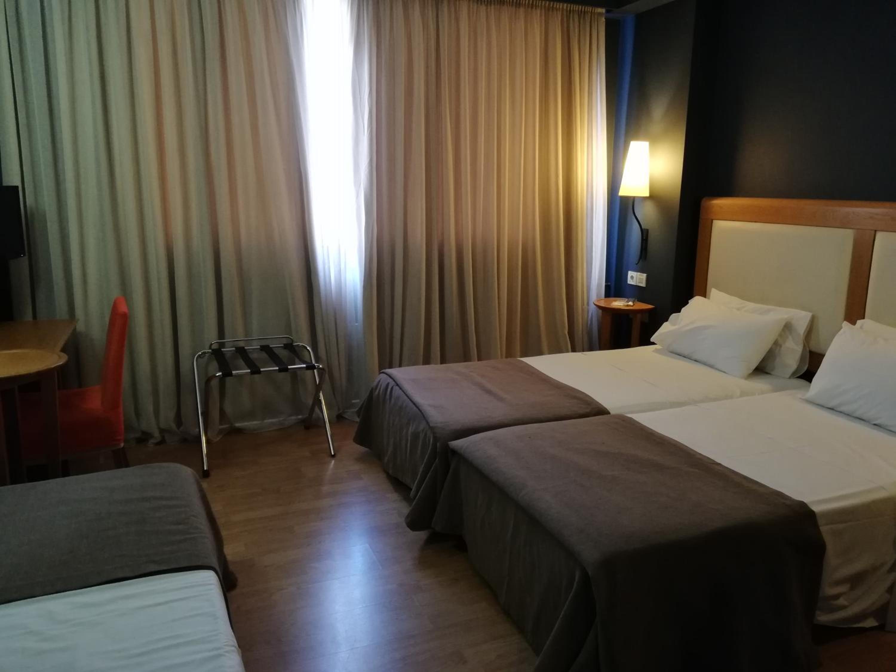 Triple Room (2 Adults + 1 Child)