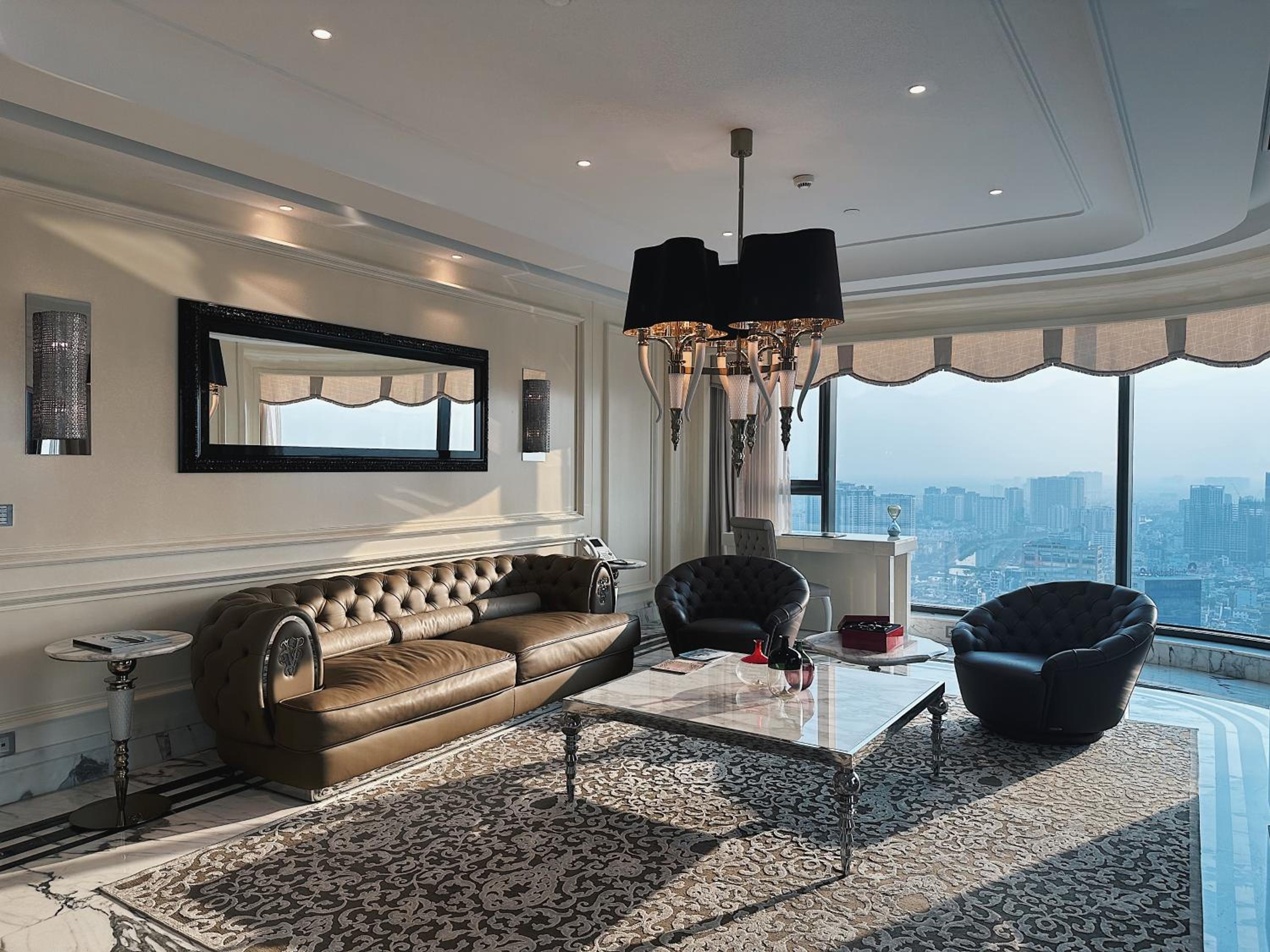 Designer Suite with Two-way Airport Transfer and Executive Lounge Access