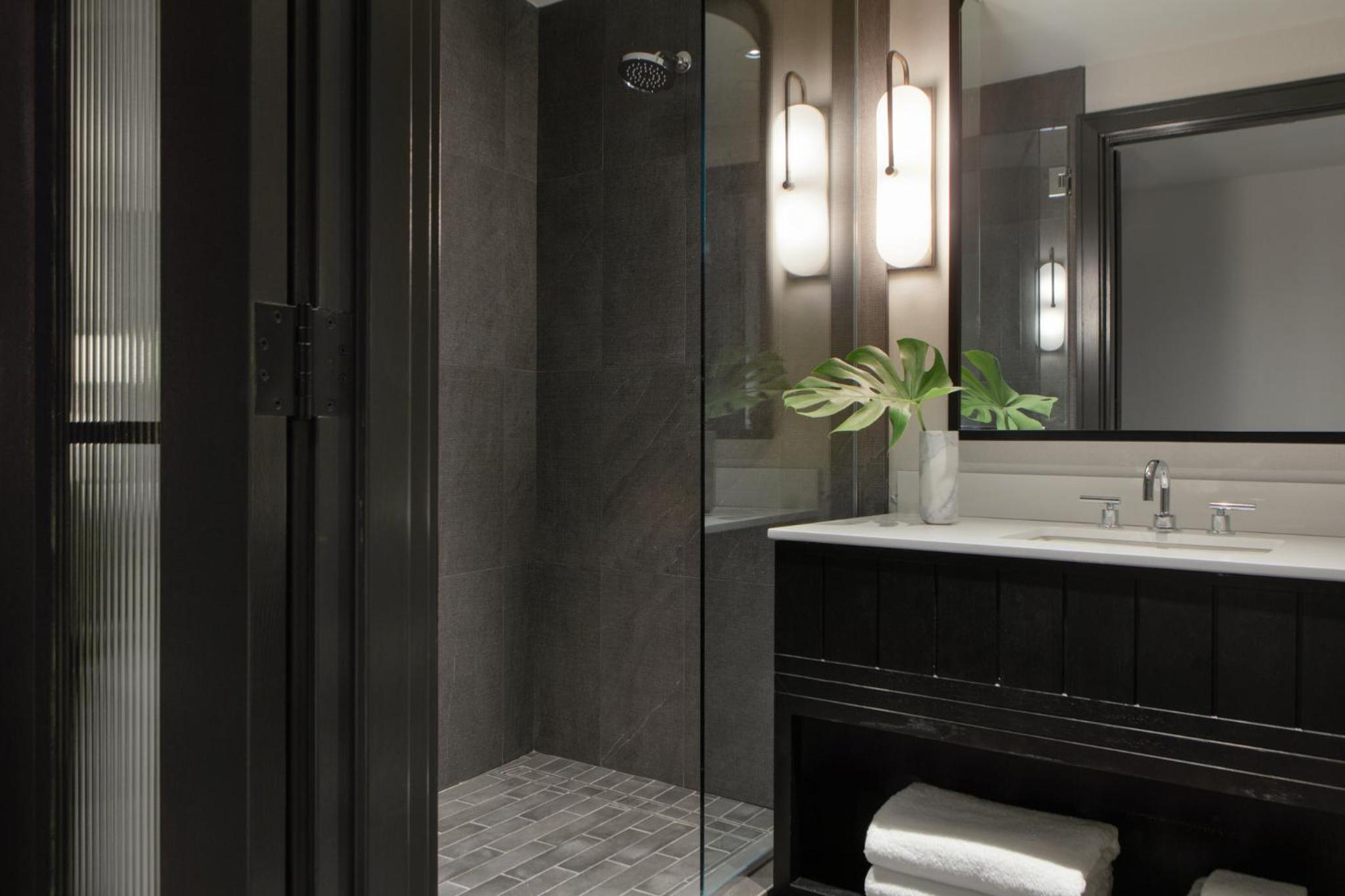 Essential Queen Room with Two Queen Beds and City View