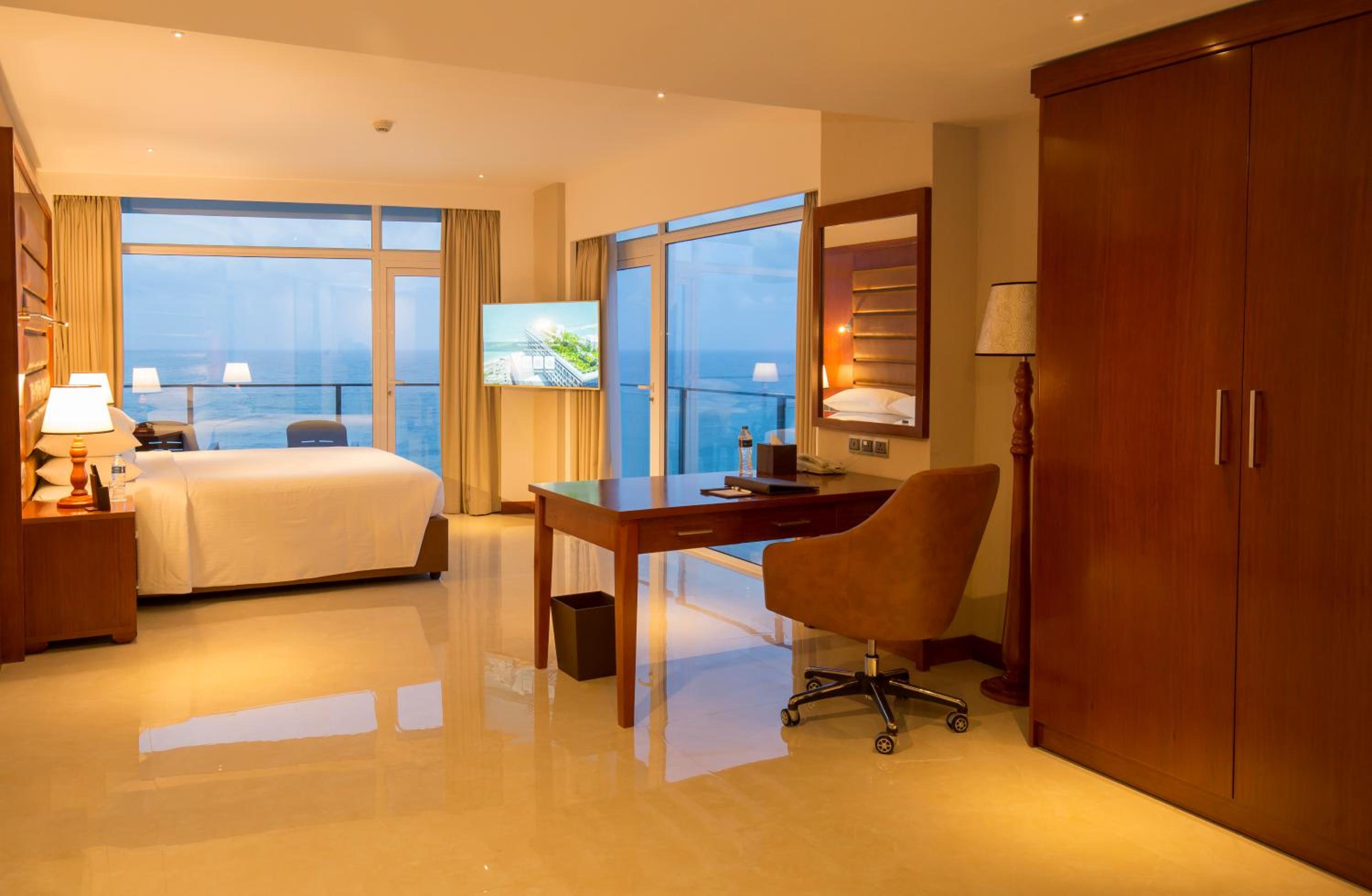 Signature Sea View One Bed Room Suite with Complimentary City Tour & Access to Beach Lounge