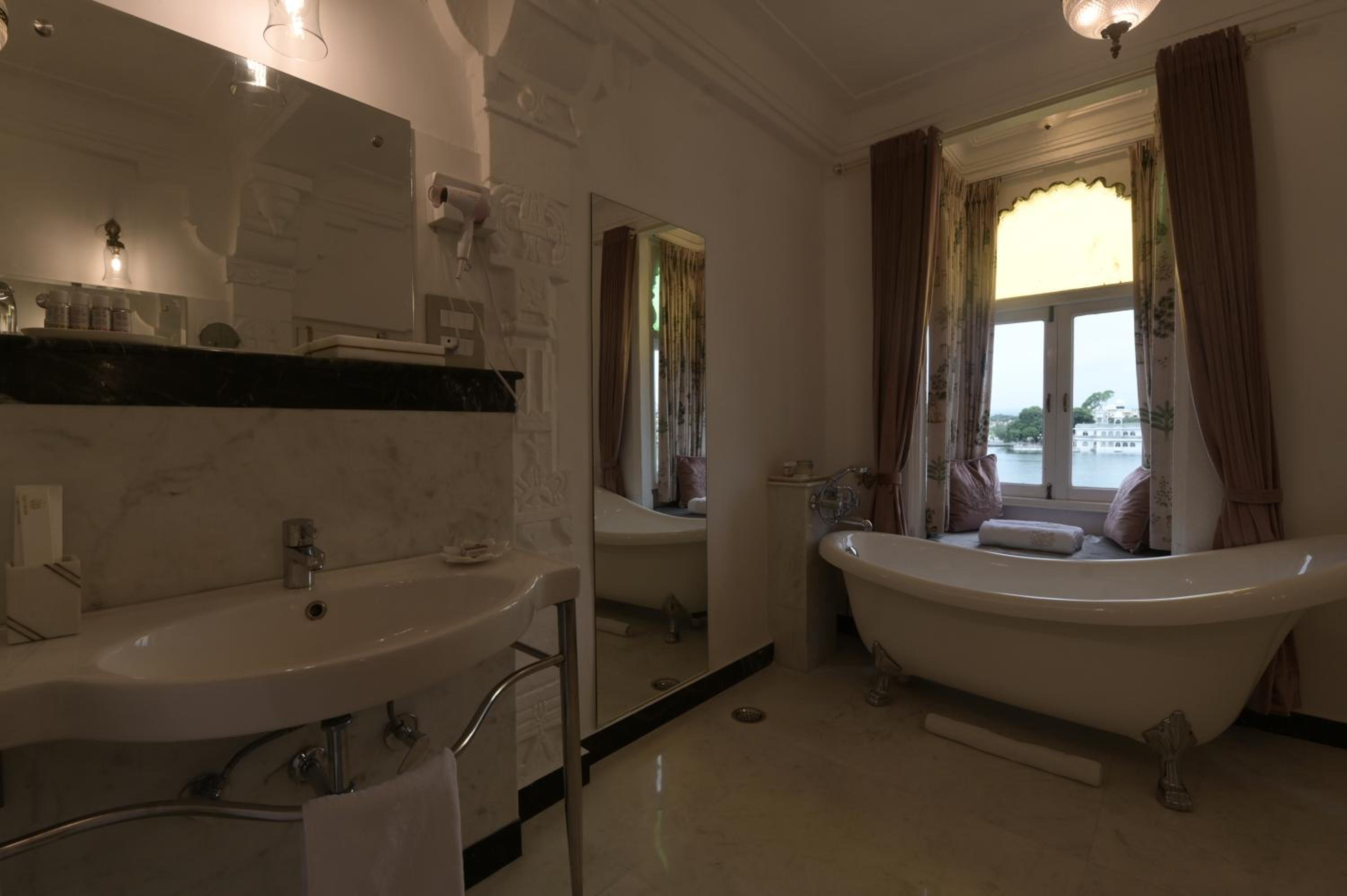 Suite with Lake View :  Avail 15% Discount on all restaurant bills,50% Discount on any spa services (Valid for stay till 30th September 2025)