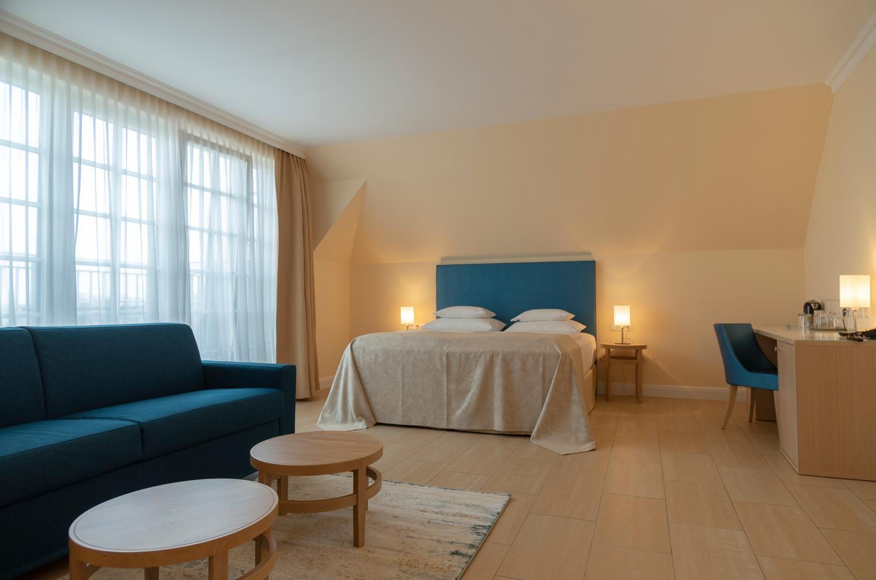 Family Room with Balcony or Terrace and Garden View