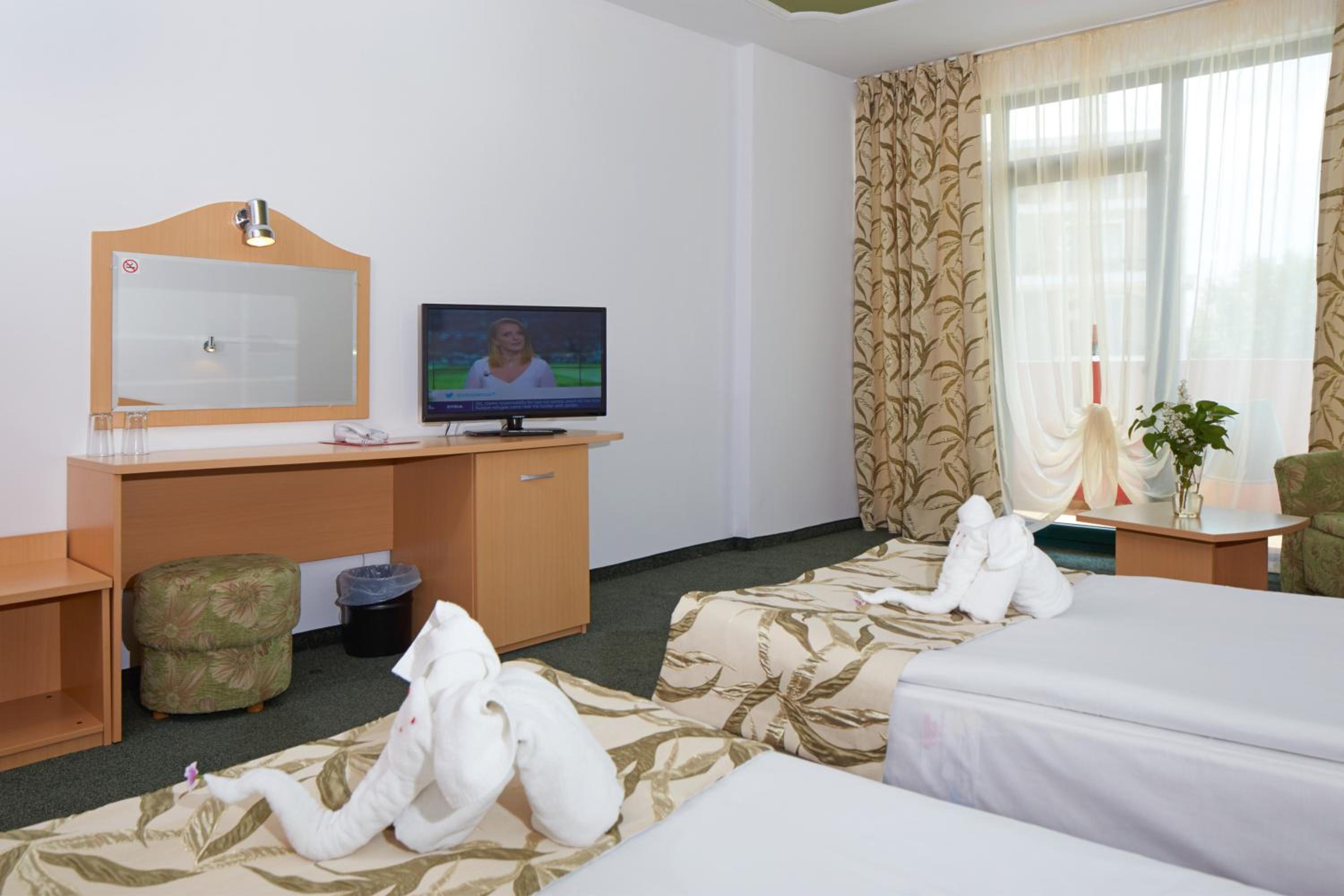 Twin Room with Balcony (2 Adults + 1 Child)