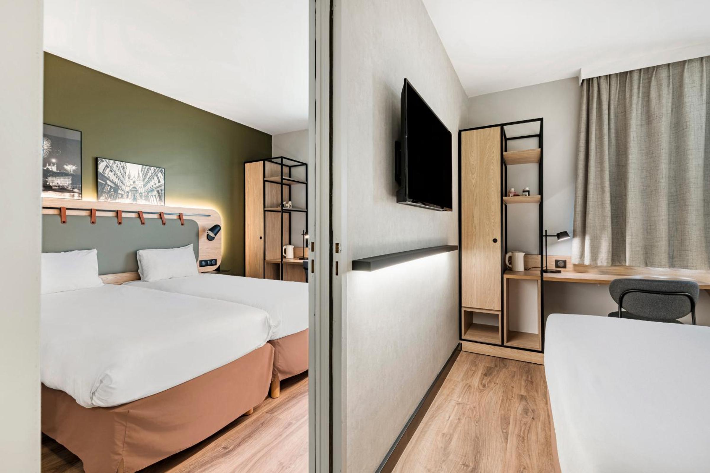 Quadruple Room with One Double Bed and Two Single Beds or Sofa Bed