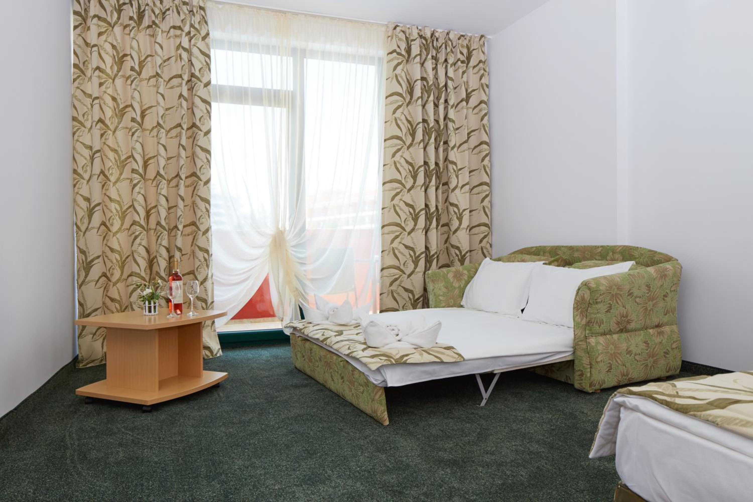Family Room with Balcony (2 Adults + 2 Children)