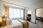 One-Bedroom King Suite with Balcony 1 в Crowne Plaza Bucharest