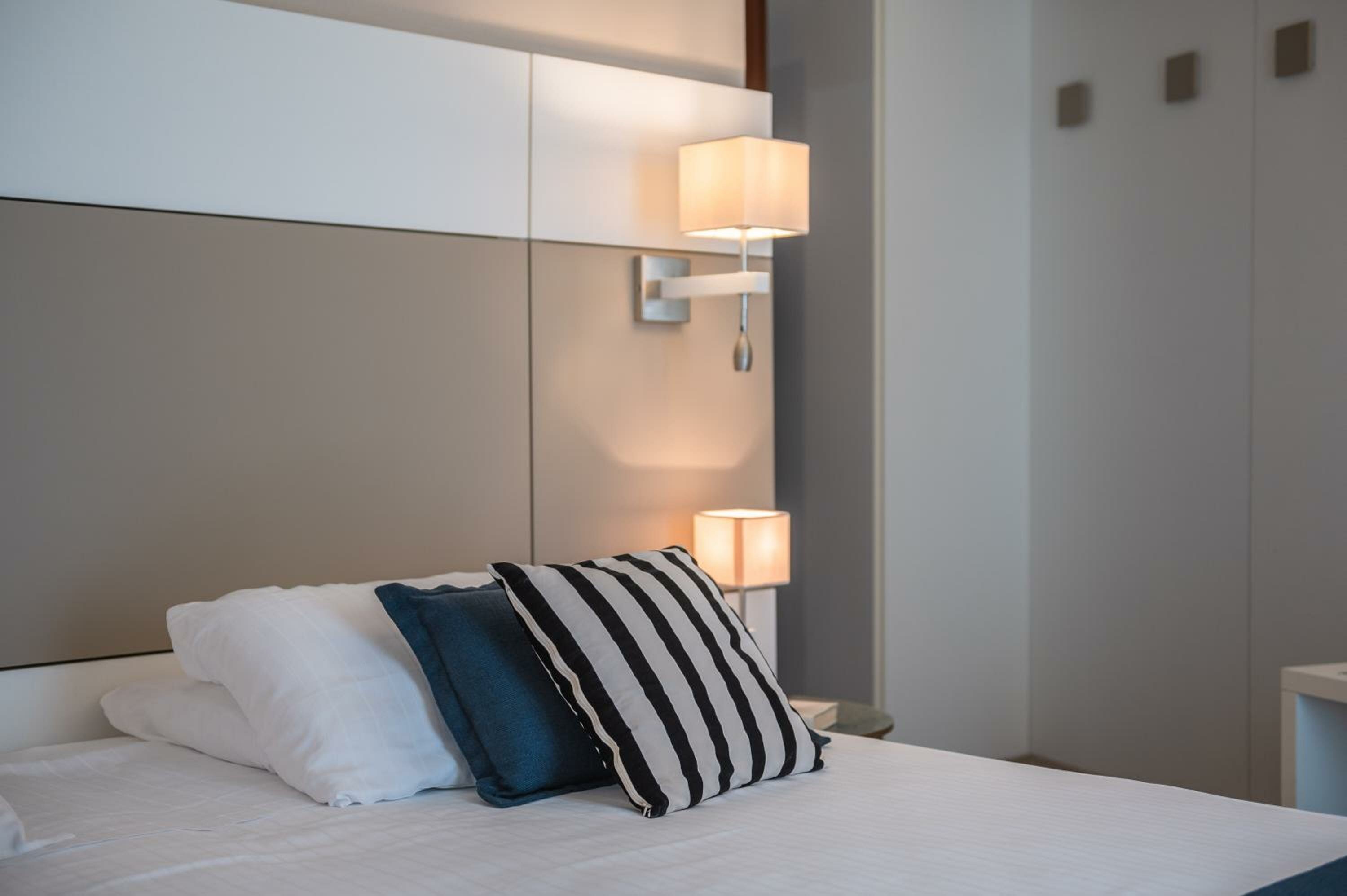 Classic Quadruple Room with Balcony and Lateral Sea View