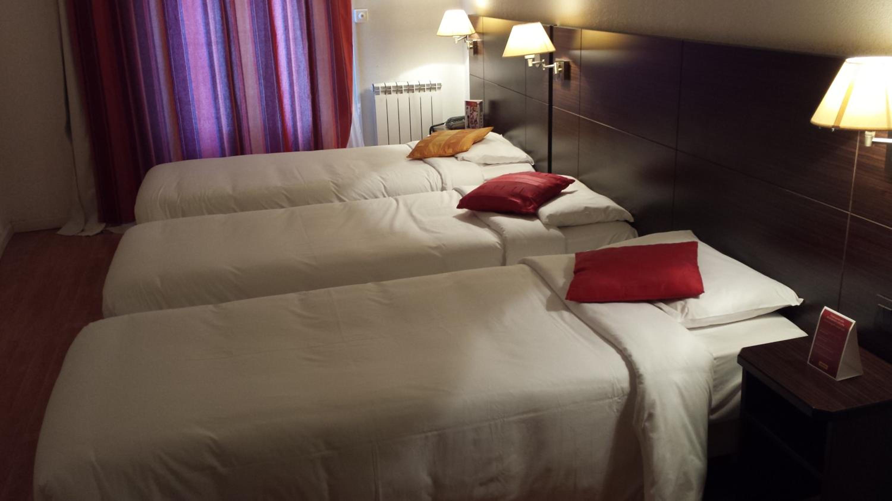 Triple Room with Three Single Beds