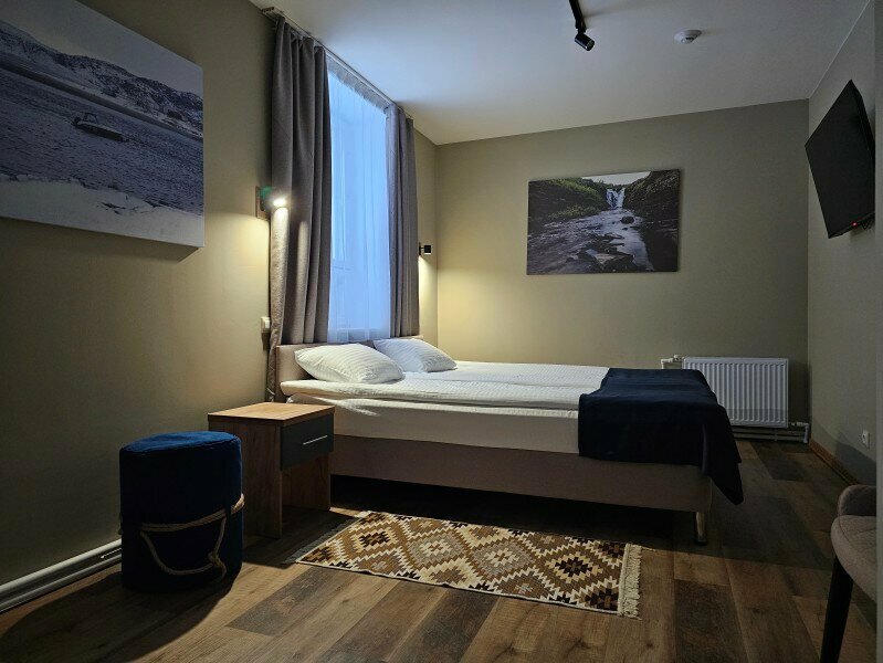 Двухместный номер с 1 кроватью или 2 отдельными кроватями и общей ванной комнатой