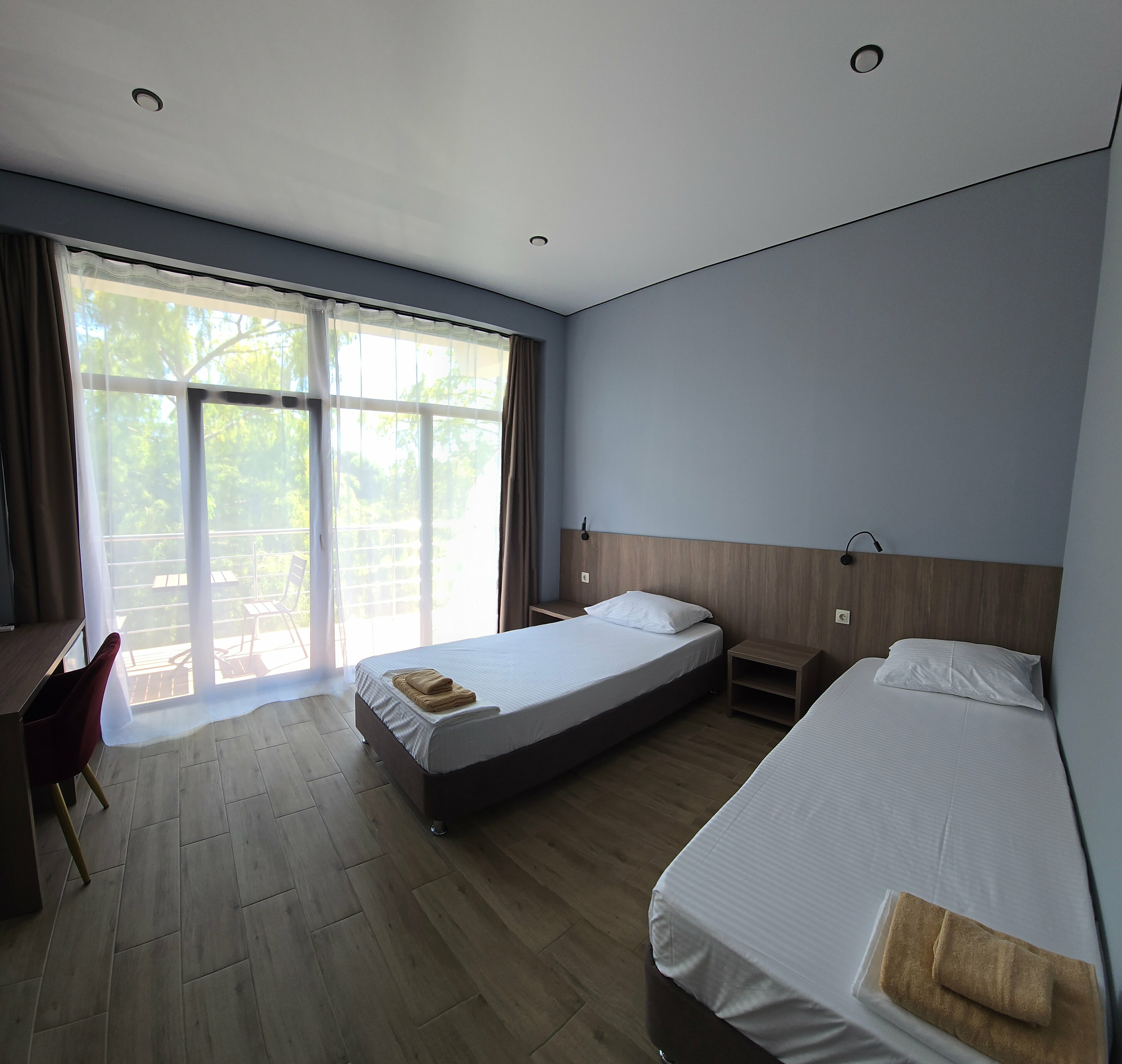 Двухместный номер с 2 отдельными кроватями и балконом