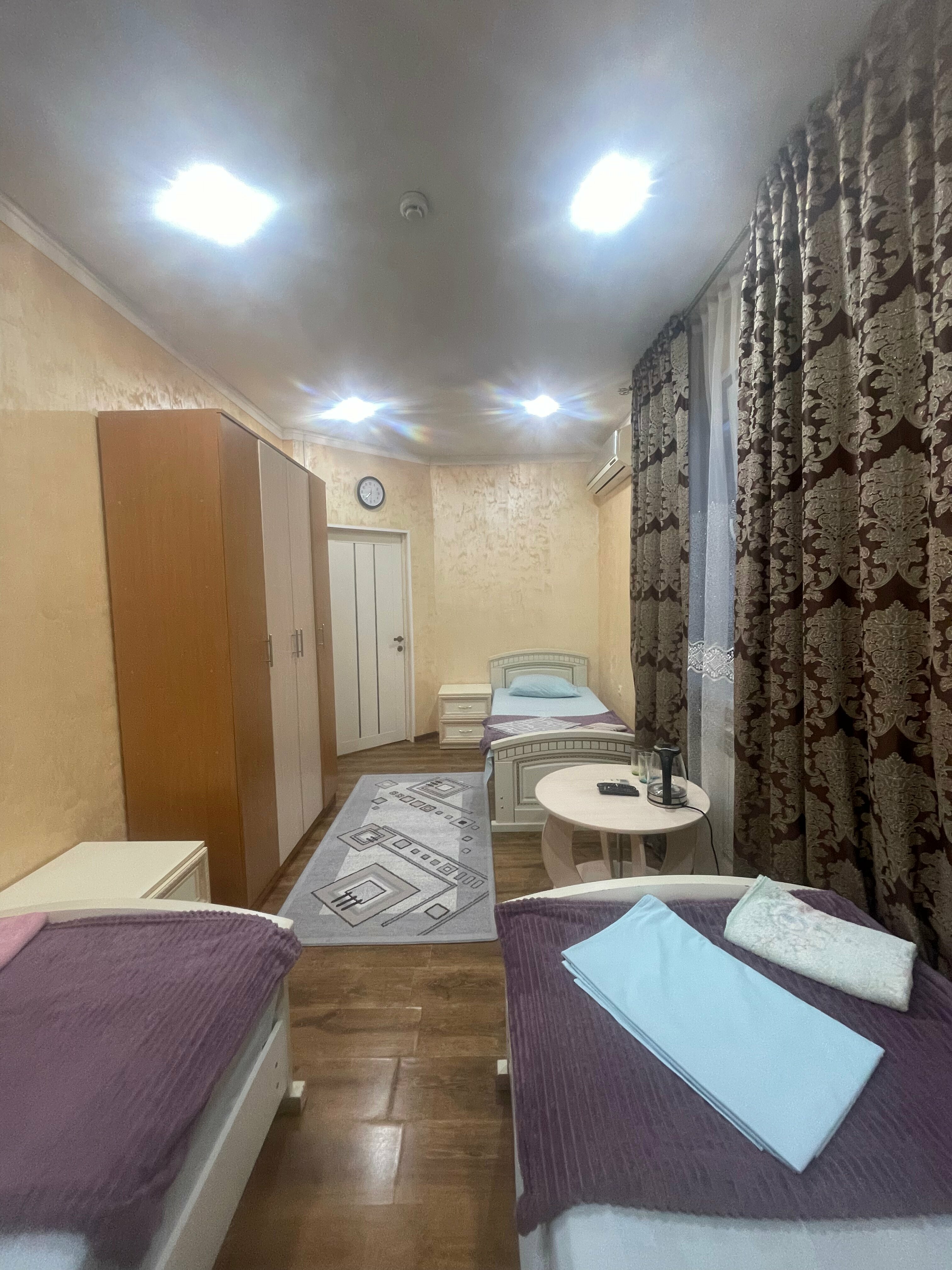 Трехместный номер с душем