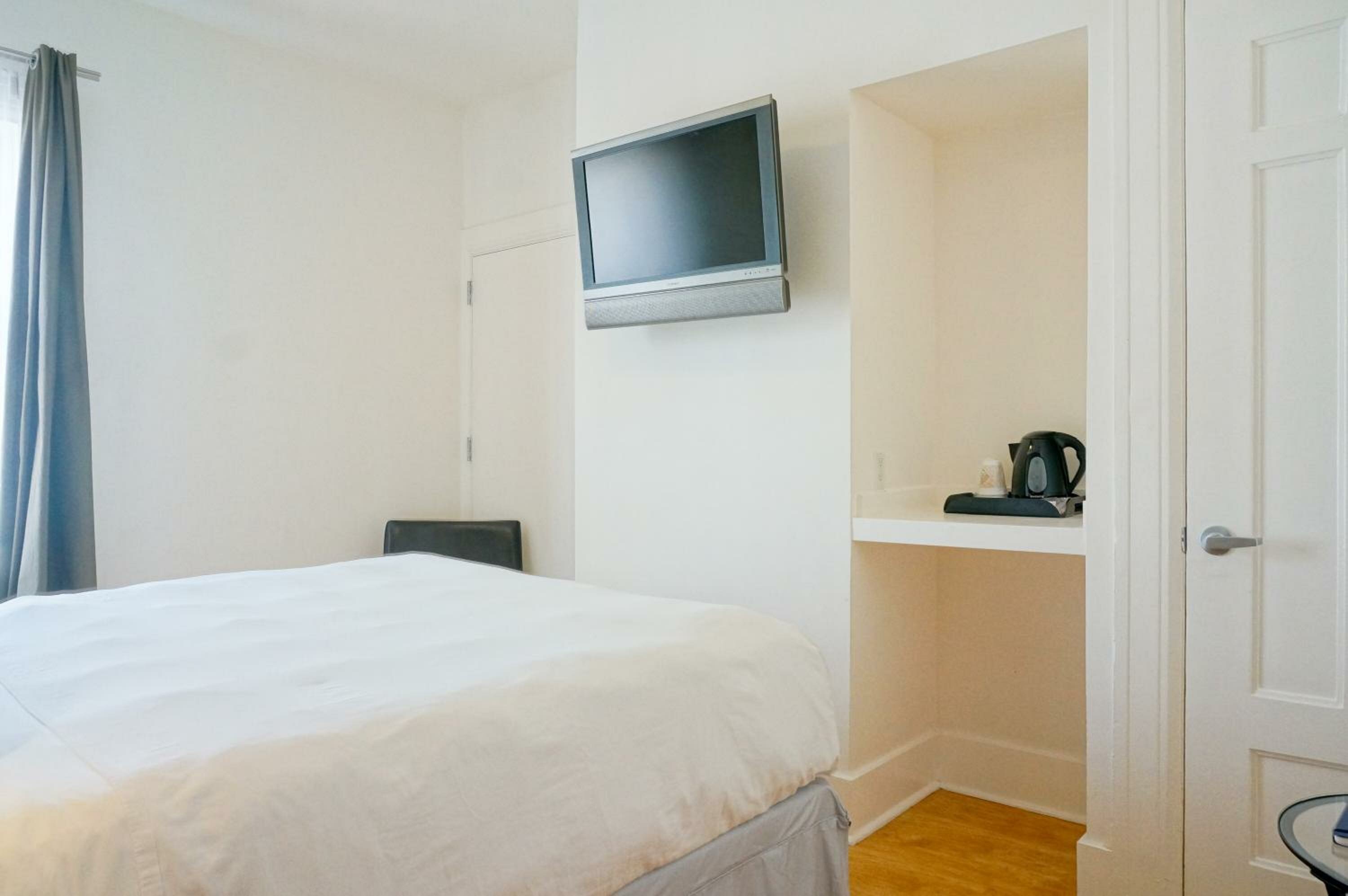 Queen Room With Shared Bathroom